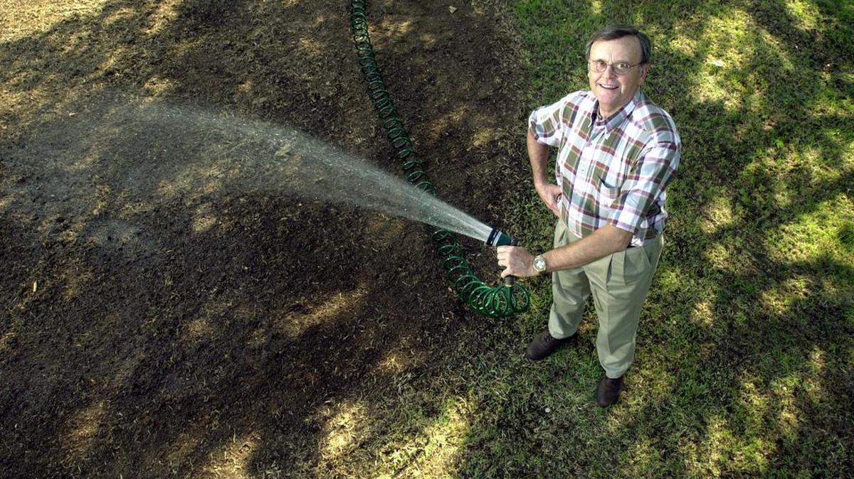 Watering thoroughly is key when overseeding bare spots in your lawn after a harsh winter.