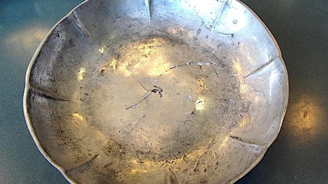 Old maps, old-style bowl have Parisian roots