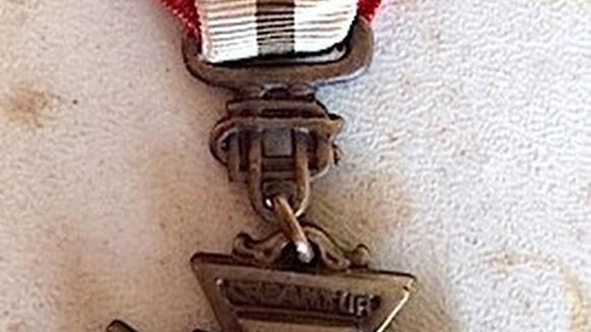 One of these medals is from a nation which no longer exists. One has high value, the other not so much.