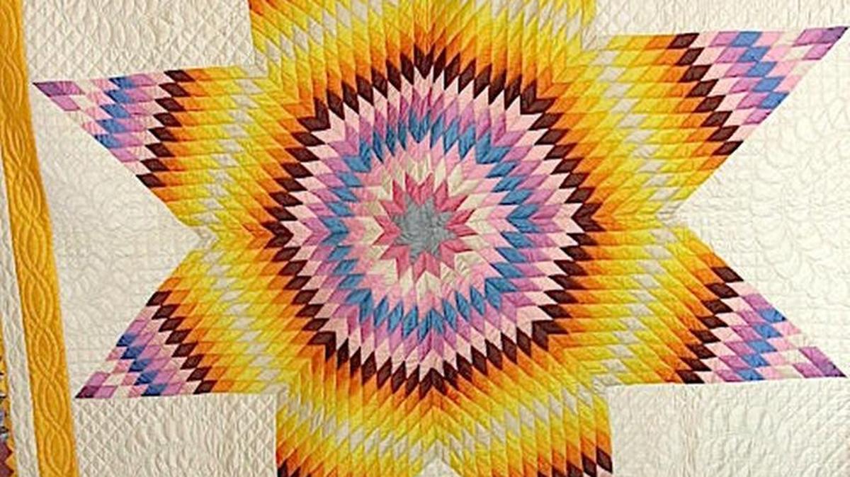 This Lone Star quilt and an early children’s ABC book printed on linen are collectible.