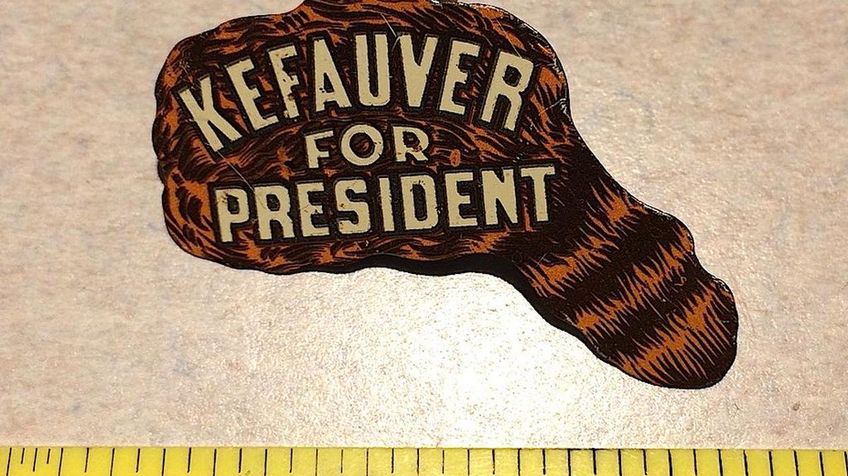 A campaign pin in the shape of a coonskin cap? Makes sense when you learn the story.