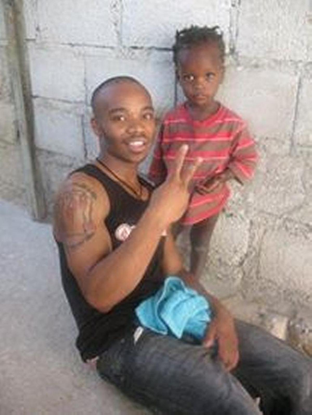 Dexter McKinley during a 2013 visit to the Heart of God orphanage where he was adopted by an American couple in 2001.