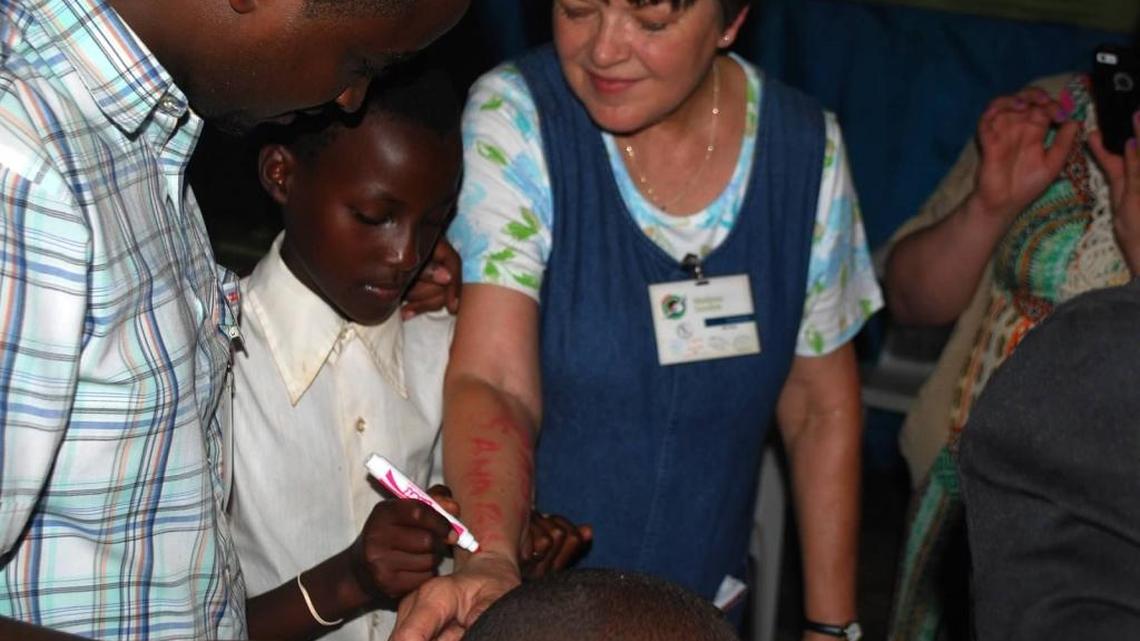 The shoebox is filled with gifts, but outside is a child’s story