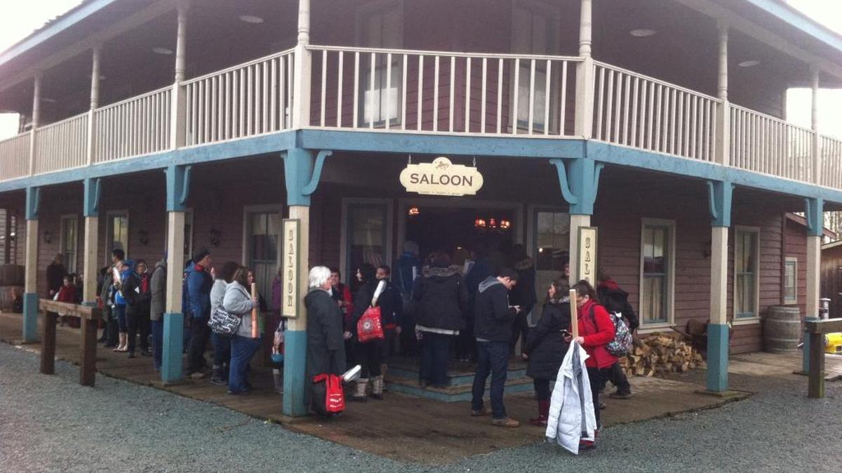 Hearties wait in line outside one of the “When Calls the Heart” set buildings on location in Langley, British Columbia. Inside the “Saloon,” members of the cast signed autographs for almost 200 Hearties for the mid-January Hearties Family Reunion.