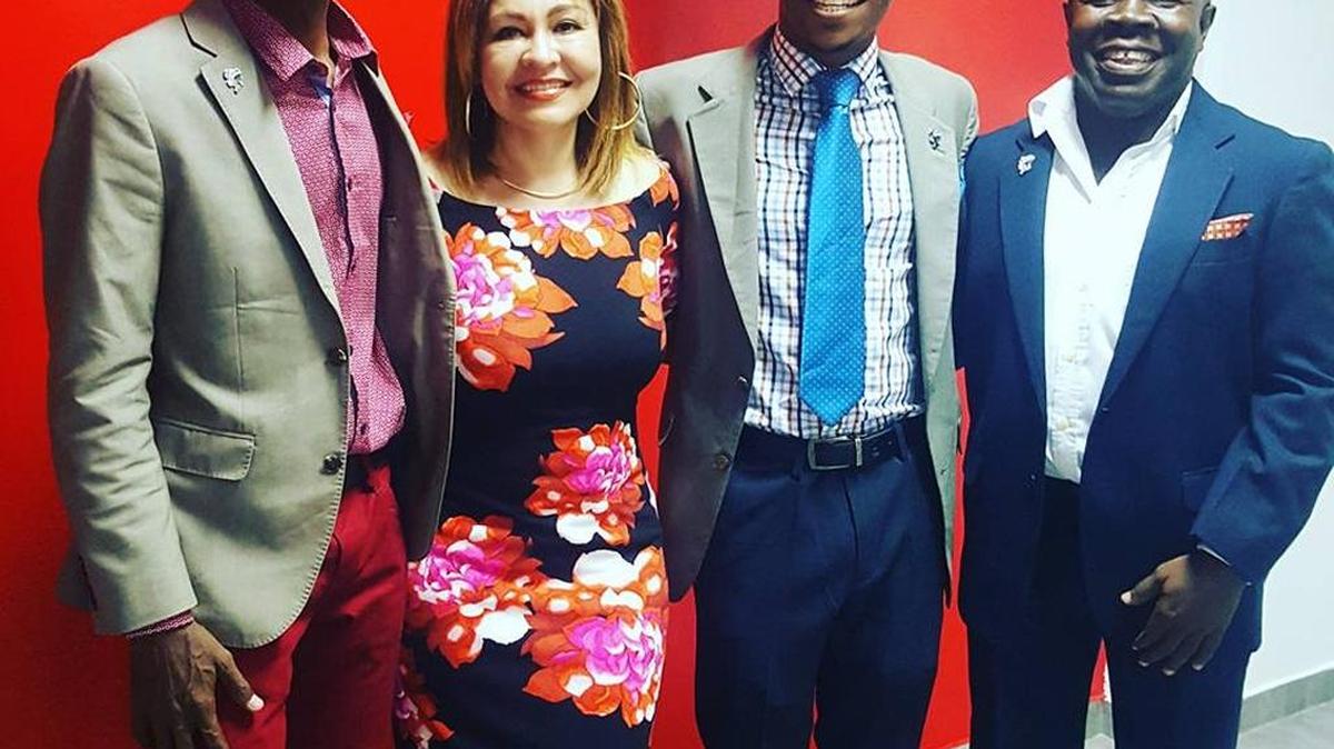 Dexter and Sandra McKinley, center, visited Haiti in February. They plan to support an orphanage there.