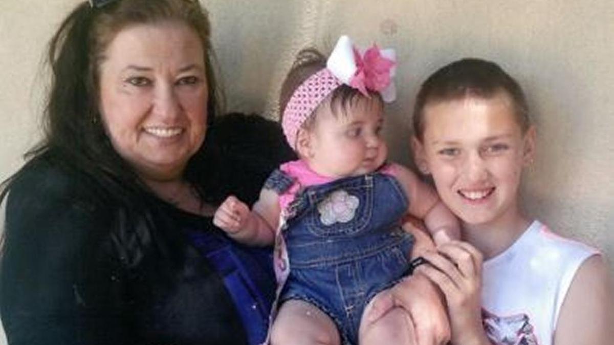 Lynn Moore with her grandchildren in the summer of 2015.