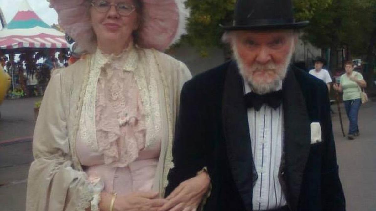 “I’m a twentieth century girl living in the twenty-first century,” said Cathy Ashcraft with her late husband Dean. The couple dressed in Victorian-era costumes sewn and created by Cathy for the 2013 Kla Ha Ya festival in Snohomish.