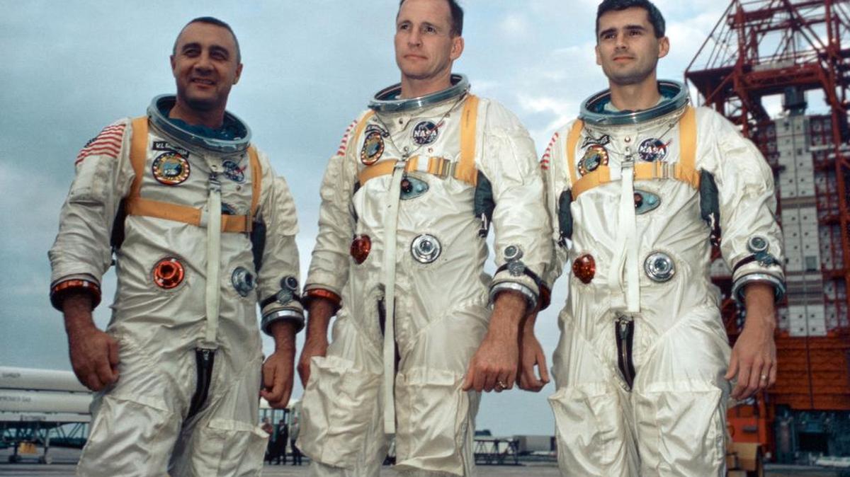 Astronauts Gus Grissom, Ed White and Roger Chaffee stand at Launch Complex 34 in Cape Canaveral, Fla., on Jan. 17, 1967. The three would die 10 days later during a training exercise on the launch pad.
