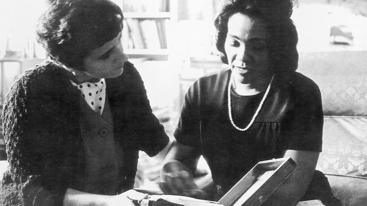 In this 1968 photo, Coretta Scott King and AP reporter Kathryn Johnson, left, review plans for The King Center during a meeting on the campus of Atlanta University in Atlanta.