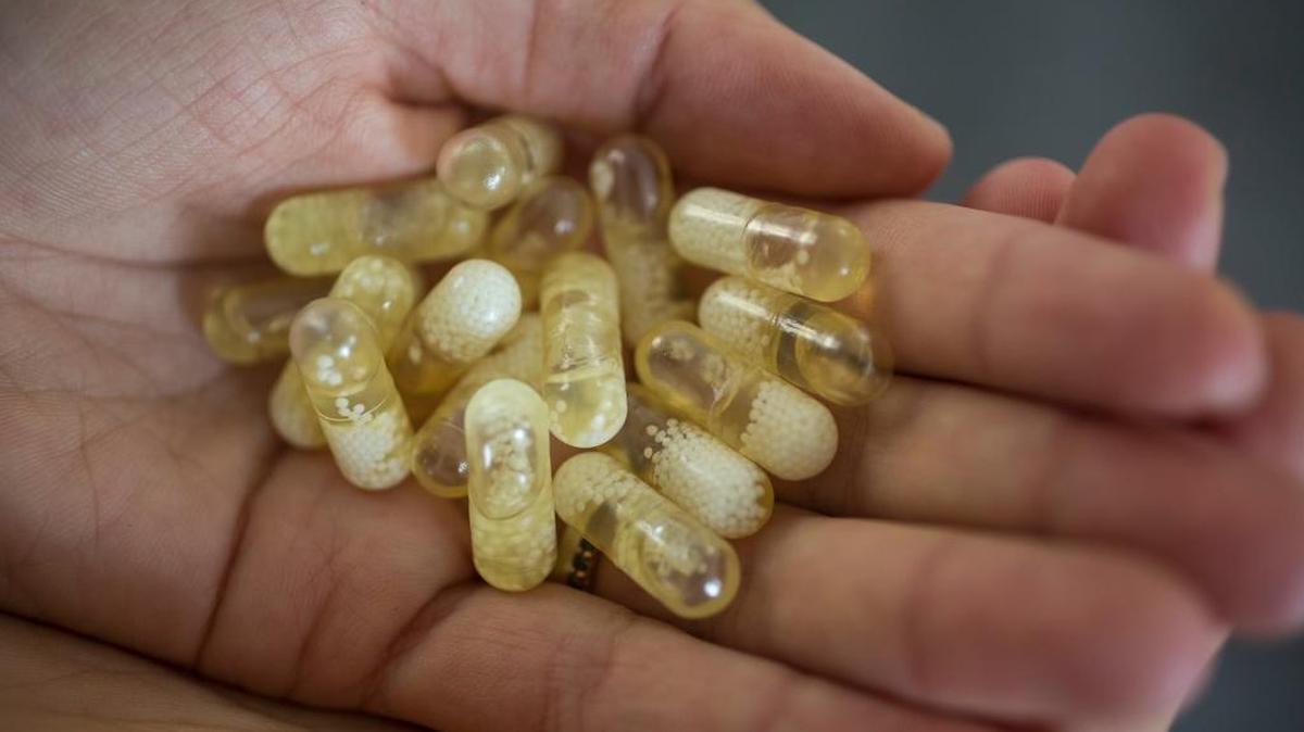 Katerina Schneider, founder of Ritual, holds prototype pills.