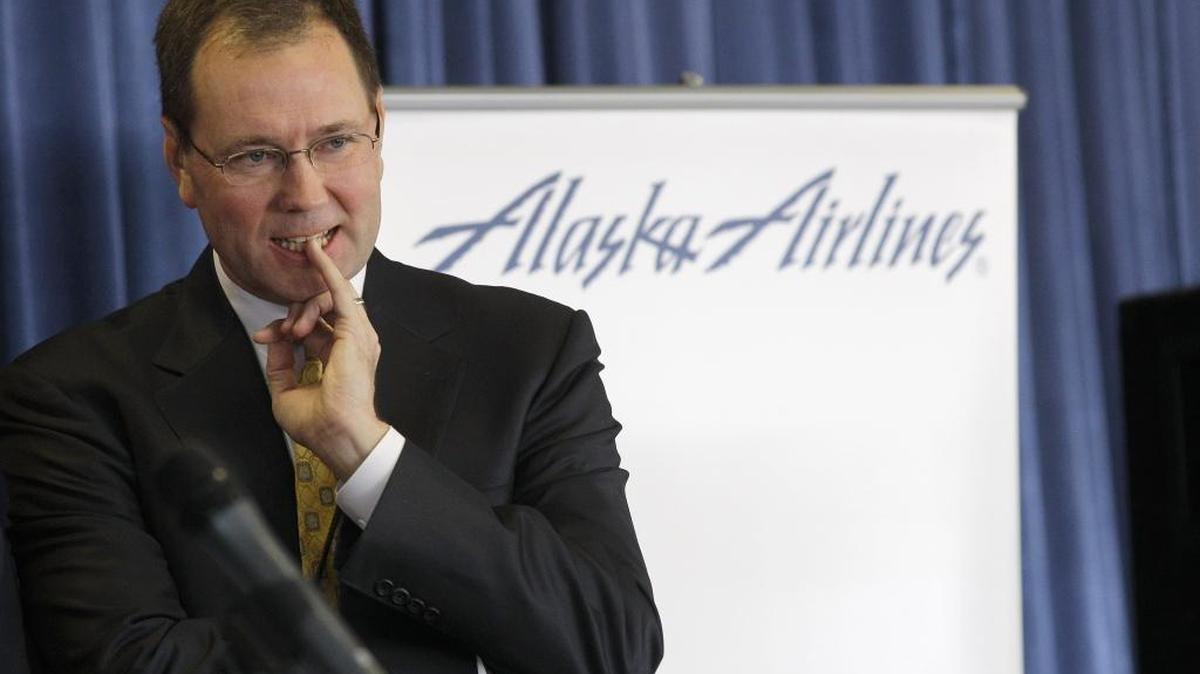 File: Alaska Airlines President and CEO Brad Tilden listens to a question from a reporter during a 2012 press event at Seattle-Tacoma International Airport in Seattle.