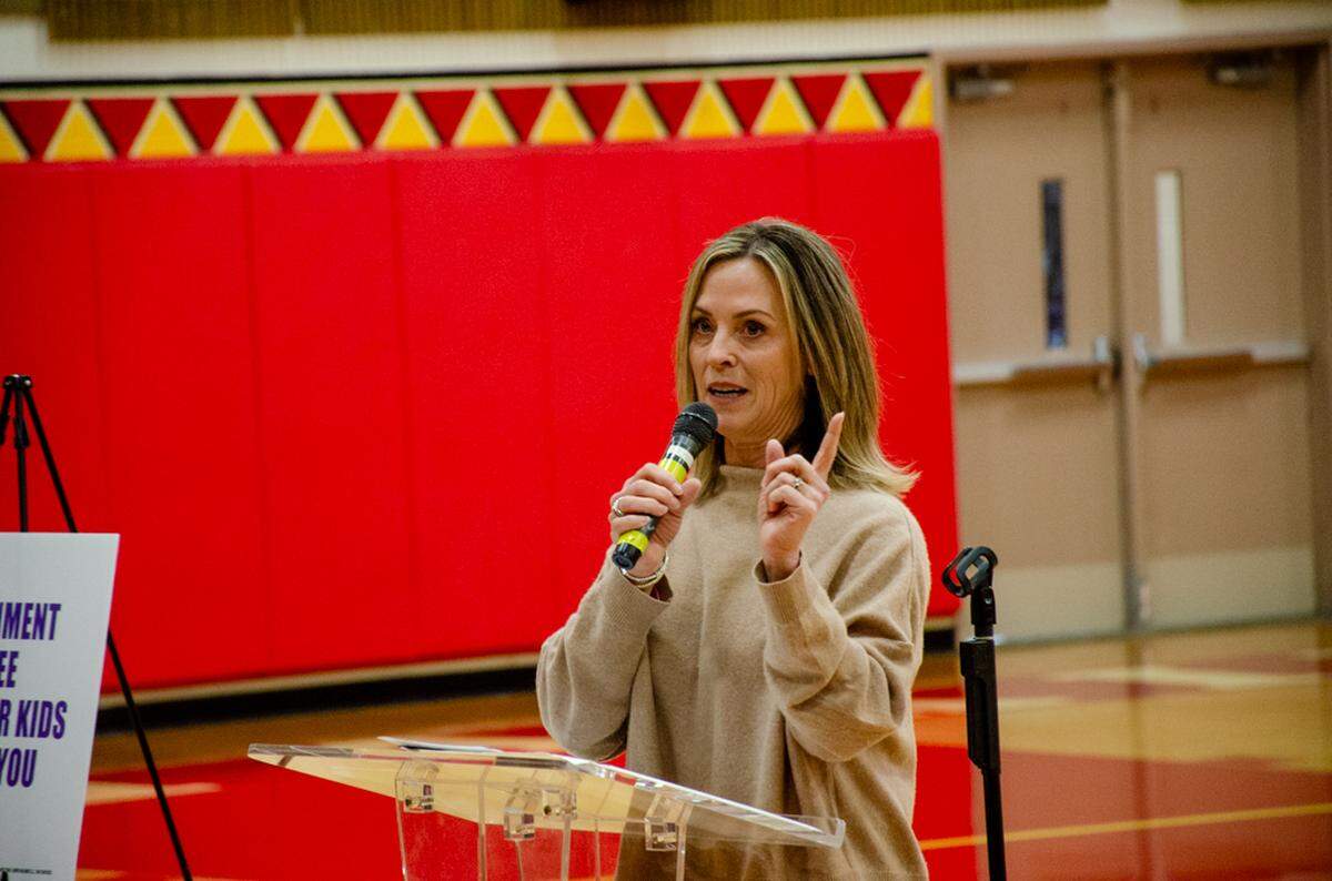 Gretl Crawford, Kennewick mayor and city councilmember, explains her support for the Let’s Go Washington initiatives at a rally Saturday, Oct. 25, in Kennewick.