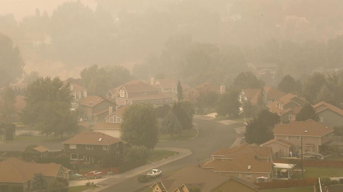 Dense smoke from regional wildfires blankets this Rancho Reata neighborhood, the Mid-Columbia and much of eastern Washington. The stagnant and smoky conditions are creating unhealthy conditions for people to be outside.