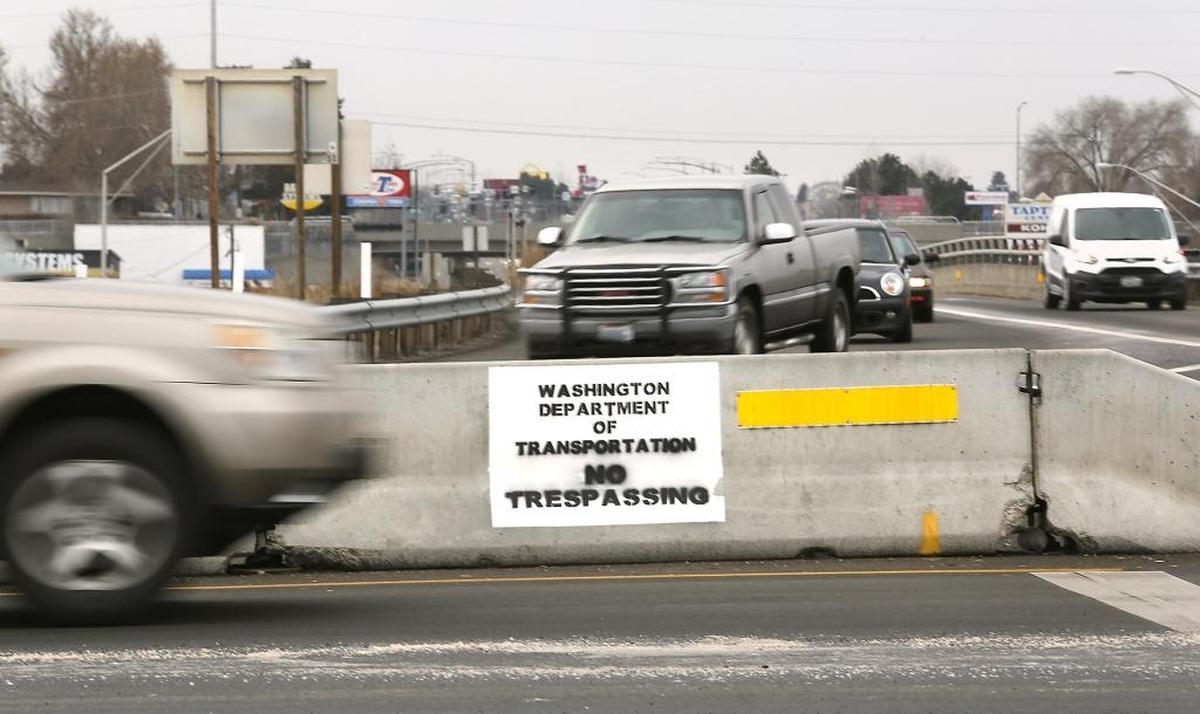 A new sign warns off trespassers from the Washington Department of Transportation interchange at Highway 240 and North Columbia Center Boulevard in Richland.