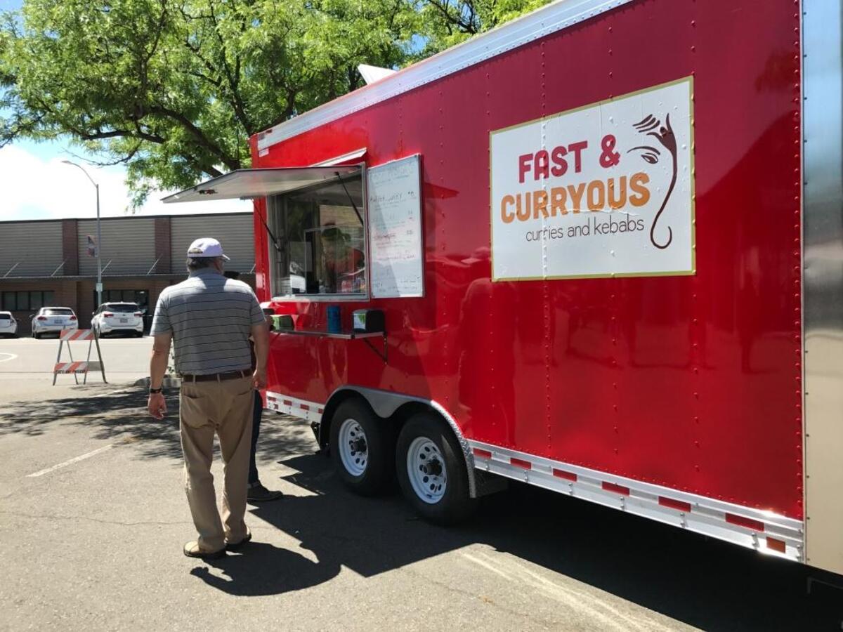 Fast & Curryous, a food truck selling curries and kebabs.
