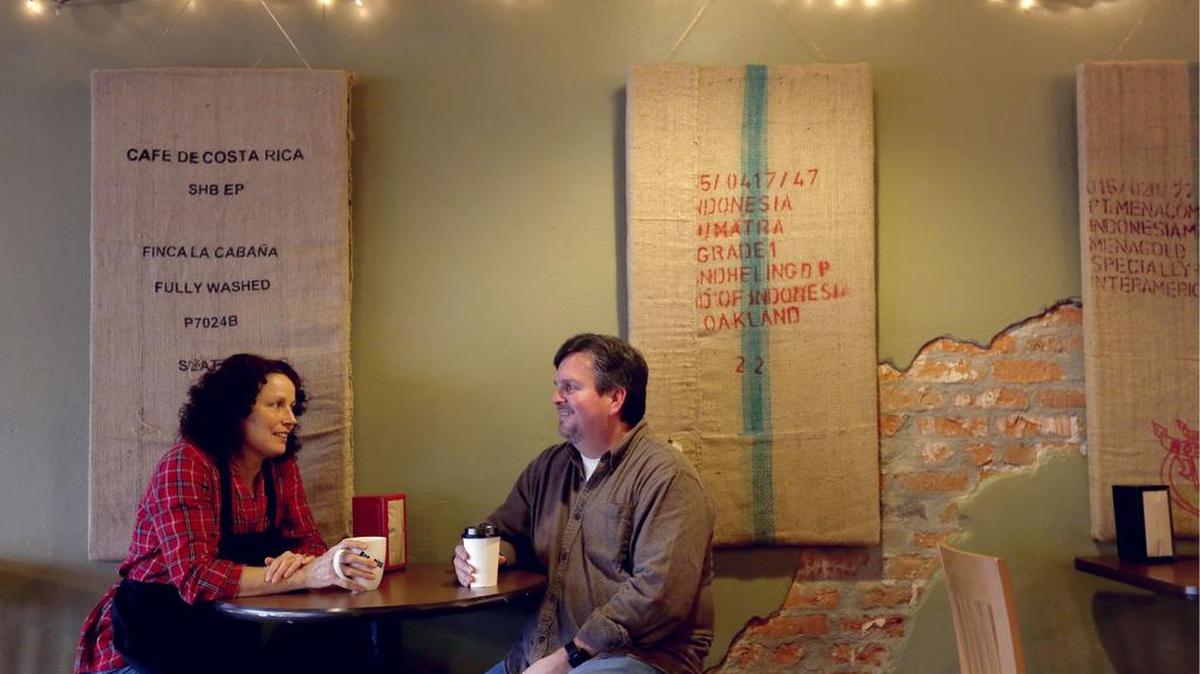 Marty Taylor, of Prosser, and his wife Lenee have a cup of coffee at their coffee house, Brewminatti, in downtown Prosser. The space also serves as a music venue, drawing artists from post-punk troubadour Peter Case to folk rockers The Ballroom Thieves.