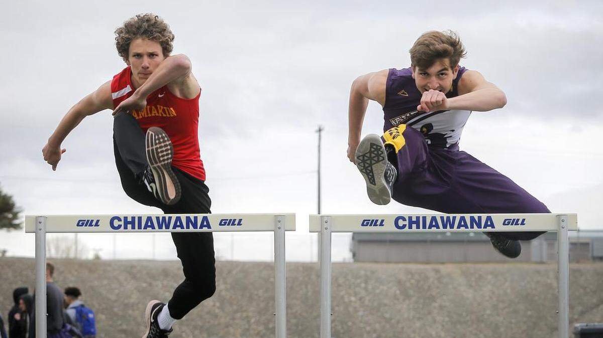 In this April 2018 photo, two of the state’s top hurdlers at the time, Kamiakin’s Parker Morgan, left, and Hanford’s Beau Franklin at shown. Franklin will be heading to state this week to compete in the 300 hurdles.