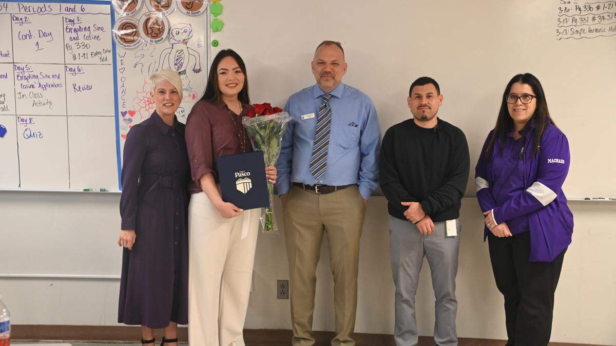 2026 State Teacher of the Year Gabriela Whitemarsh, second from left, a bilingual math teacher at Pasco High School, was selected as the Cinco de Mayo Parade grand marshal. She’s pictured here Thursday alongside Superintendent Michelle Whitney, Mayor Charles Grimm, Councilmember Mark Figueroa and Principal Veronica Machado.