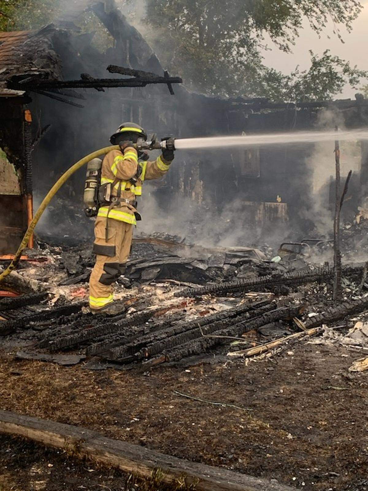 A fire demolished a home in Finley and killed one person Wednesday morning.