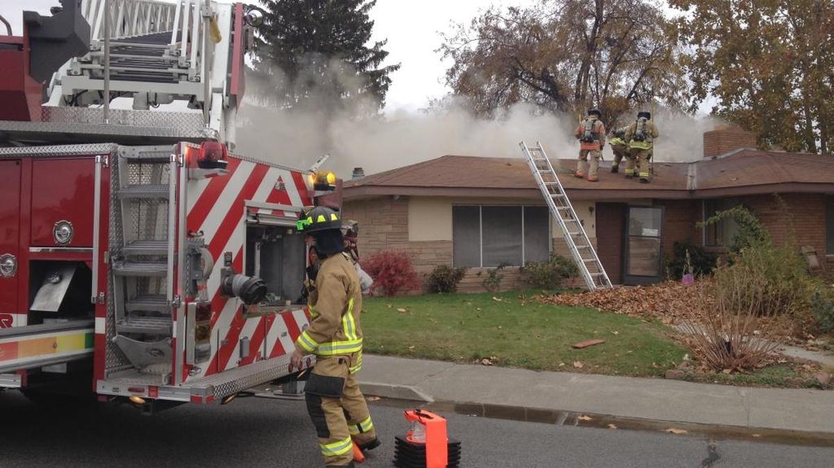 Firefighters respond to a blaze at 1516 West Howard in Pasco. A kitchen fire spread into the attic. The occupants got out safely, fire officials said.