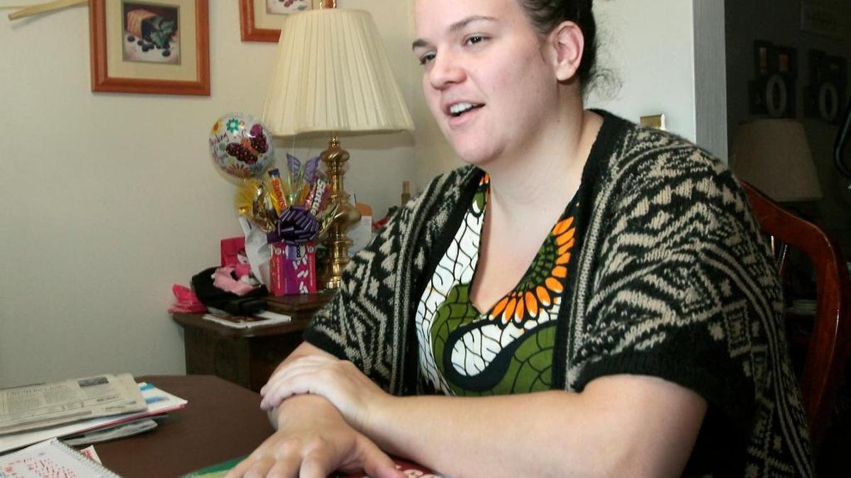 Pamela Harvey smiles while recalling the friends and co-workers who helped her survive a brutal stabbing attack while serving as a Peace Corps volunteer in Uganda. The Kamiakin High graduate recently returned to her parents’ house in Kennewick.