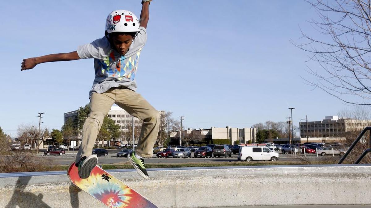 Solomon Feser, 11, of Richland, works on landing an ollie Tuesday at the skate park in Richland. Feser, who started skateboarding this summer, took advantage of the nice weather after school to work on his skateboarding trick. The forecast for Feb. 24 is for mostly sunny skies, with a high near 56, according to the National Weather Service.