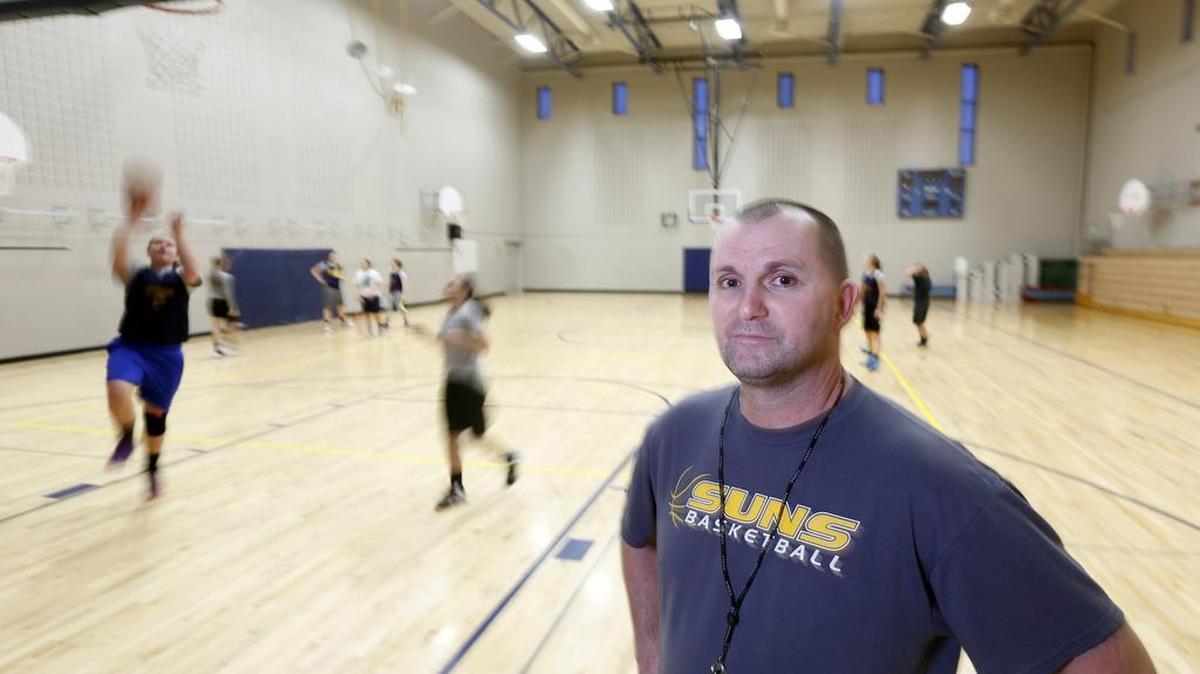 Robert Wirtzberger, the Southridge High School freshman girls basketball coach, stands in the gym during a recent practice at the school in Kennewick. Wirtzberger is one of the organizers of the new Tri-Cities Amateur Athletic Union youth basketball league. Previously, teams were based in Yakima.