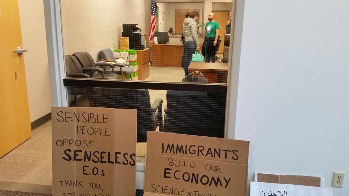 Several dozen social justice activists gathered at the Richland office of U.S. Rep. Dan Newhouse’s on Monday after the congressman expressed concern about Friday’s indefinite ban on travel from Syria, Sudan, Iran, Iraq, Somalia, Libya and Yemen.