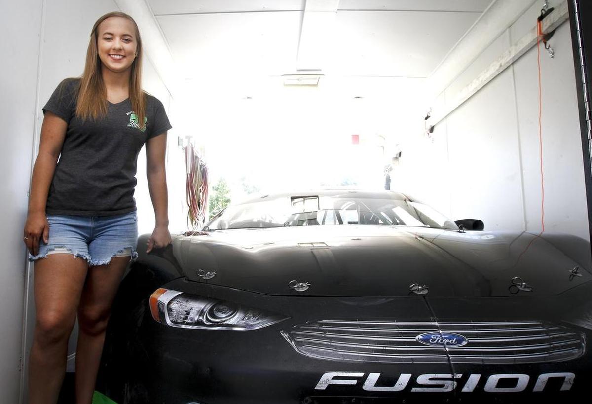 July 8, 2017 - Brittney Zamora stands next to her race car outside of her home in Kennewick. Zamora has been racing since she was 5 years old. Zamora will be competing Saturday in a race in Meridian, Idaho.