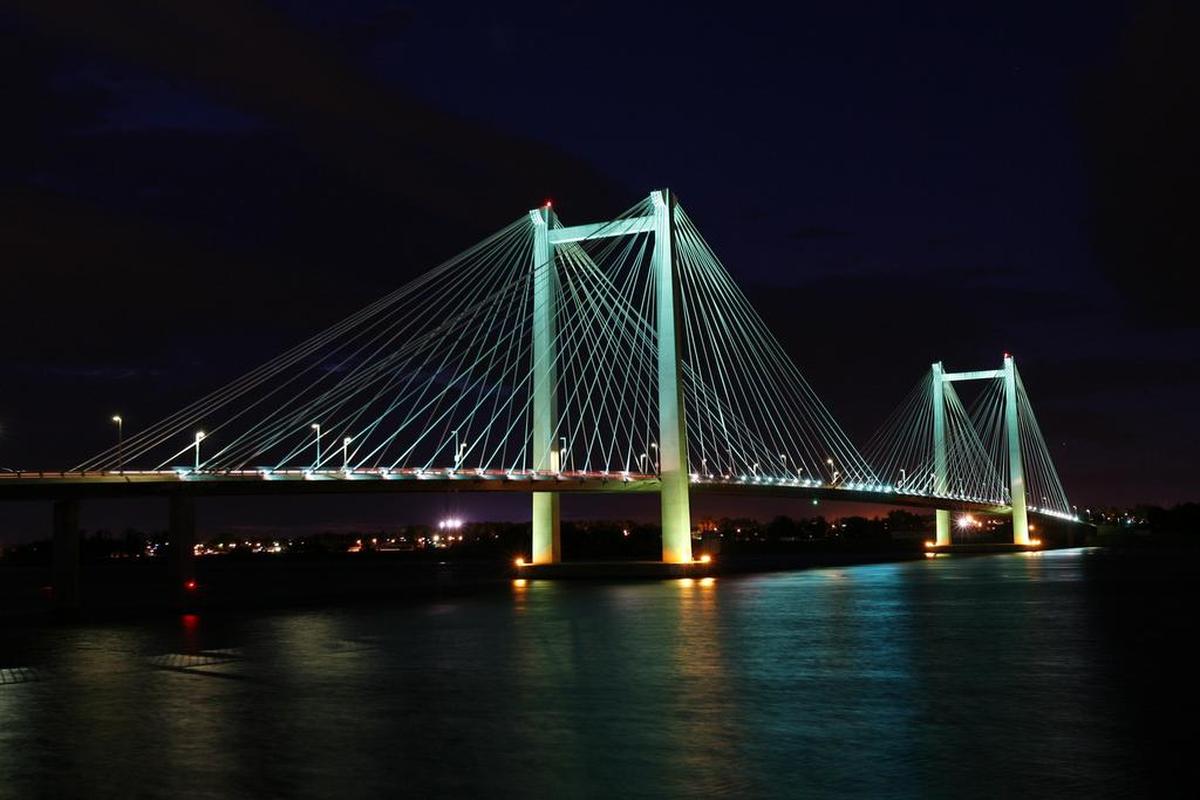 The cable bridge turns the color teal at the end of August in 2013 to raise awareness of ovarian cancer.