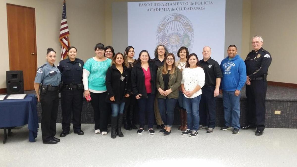 The graduating class for the Spanish-language citizens academy is shown.