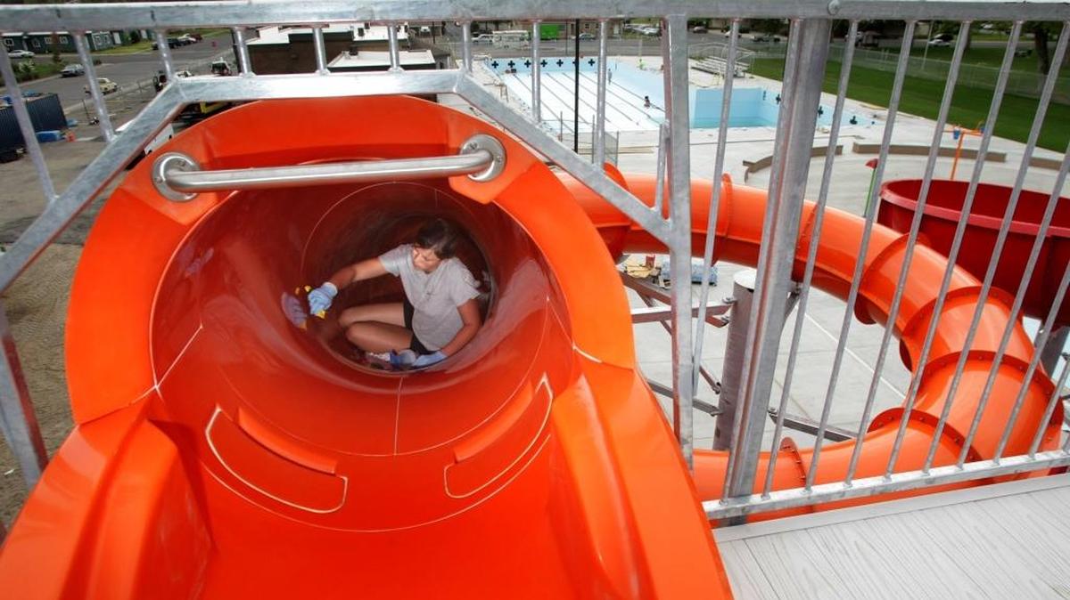Karessia Tschanz works inside one of two new water slides in 2010 at Pasco’s Memorial Park Pool.