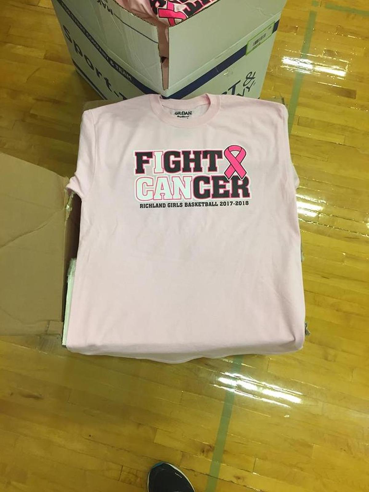 The Richland High School girls basketball program is selling these pink shirts as a fundraiser for the Kadlec Auxiliary Mammogram Assistance Fund, which covers the cost of screening mammograms for uninsured women.