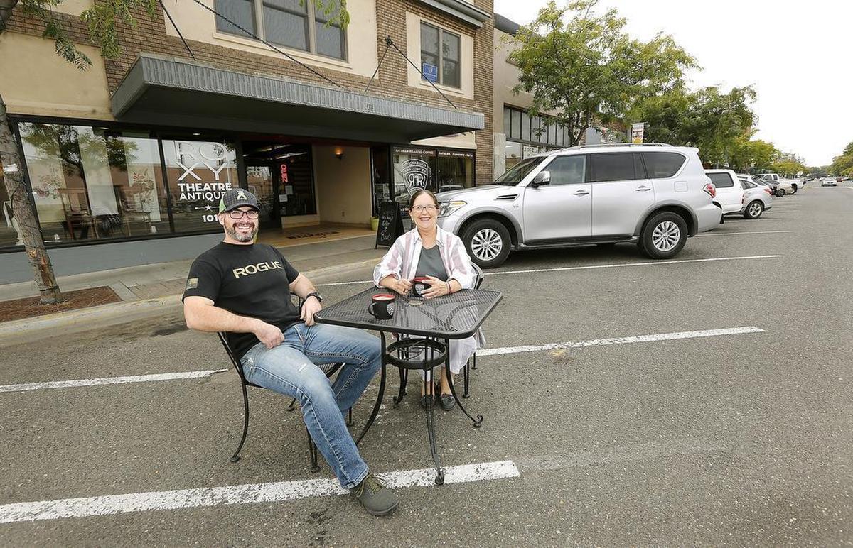 Travis Jordan, left, owner of Rockabilly Roasting, and Ann Steiger, owner of the Roxy Theatre Antiques, are excited supporters of the “Streateries.”