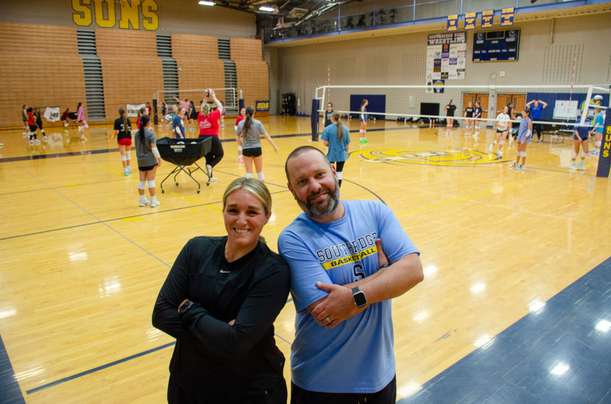 Kamiakin softball coach Kylee Lete and Southridge girls basketball coach Derrek Lete crash the Suns volleyball practice for a photo. Both were named Mid-Columbia Conference “Coach of the Year” this year, a possible first for a husband-wife duo.