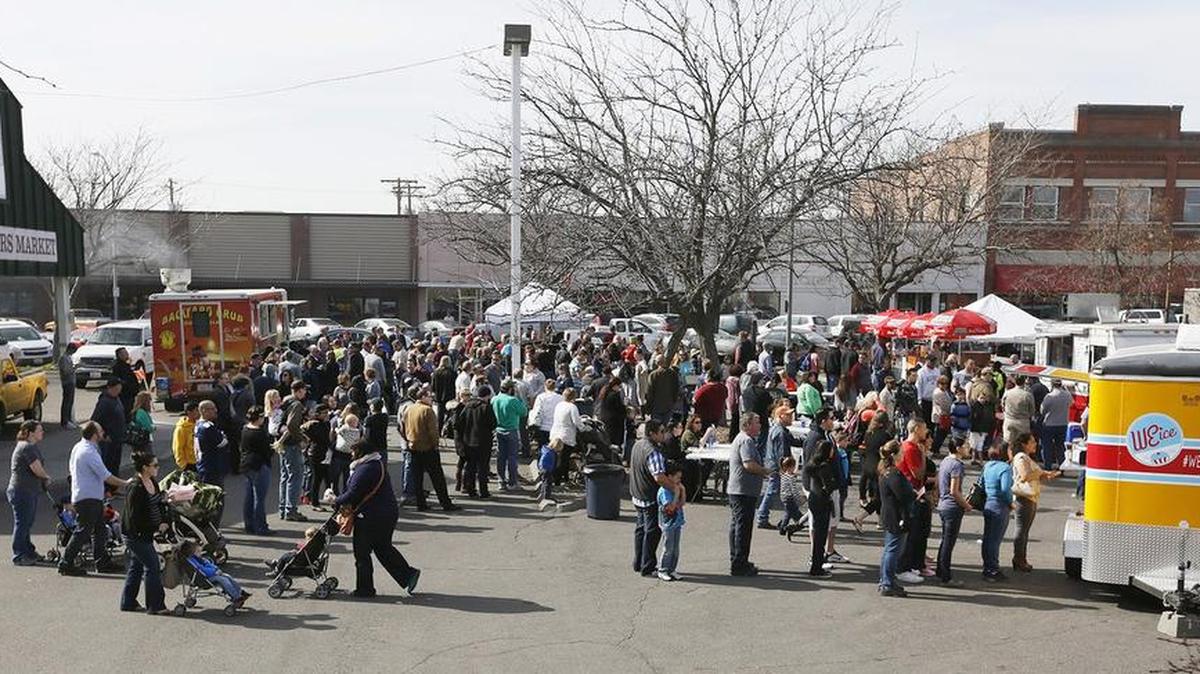 A large group gathers at the Pasco Farmers Market in 2015 for the debut of the Food Truck Friday event.