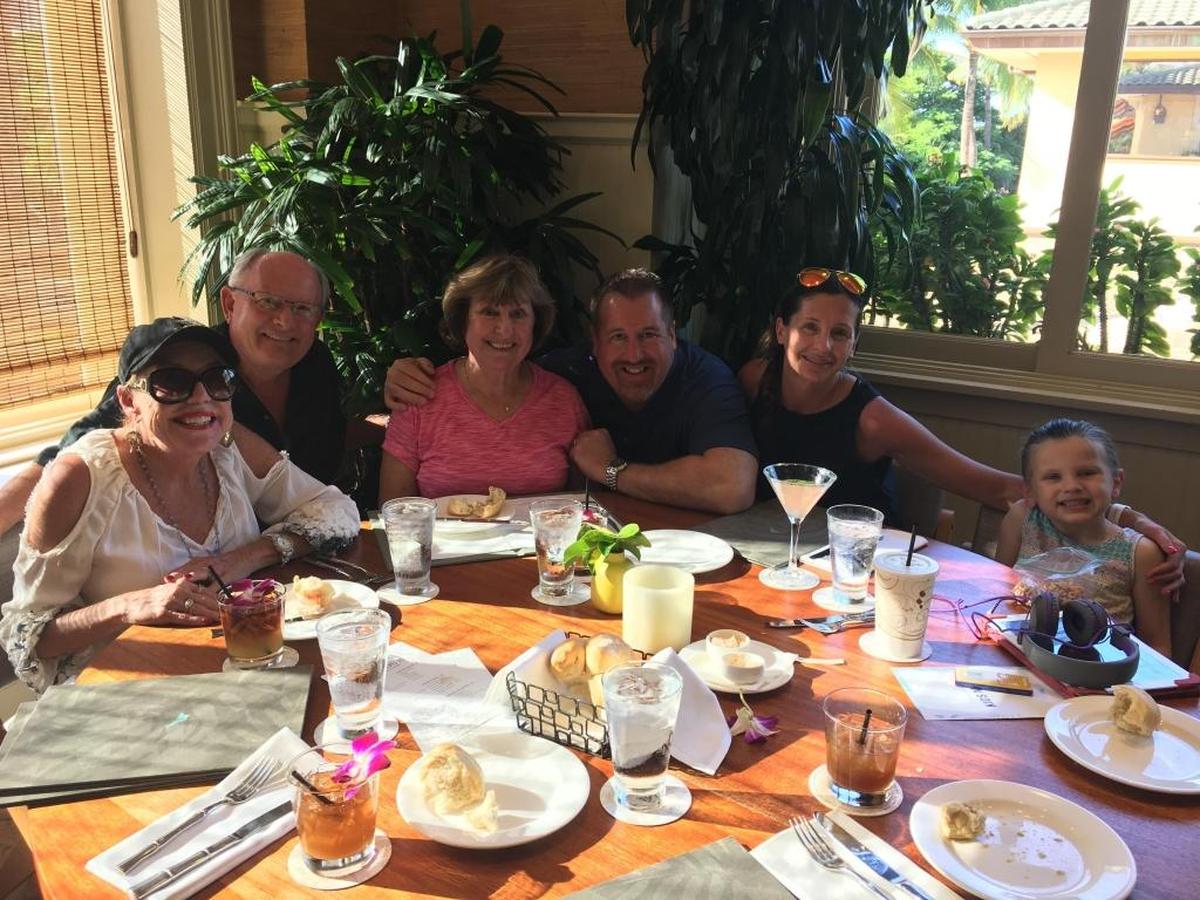Brian and Taryn Conrad of Kennewick, right, were vacationing in Maui, Hawaii, with their daughter Ashelyn, 5, and Brian’s mother, Sue Conrad, center, when they received an emergency alert that a ballistic missile was headed their way. They were with family friends Mary and Phil Priebe, left.