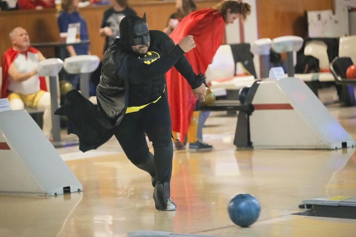 March 3, 2018 - Batman bowls at Atomic Bowling during Junior Achievement’s 22nd Annual Comic Con Bowl-A-Thon on Friday in Richland. Batman’s secret identity is Angel Hernandez of CH2M Plateau Remediation Company.