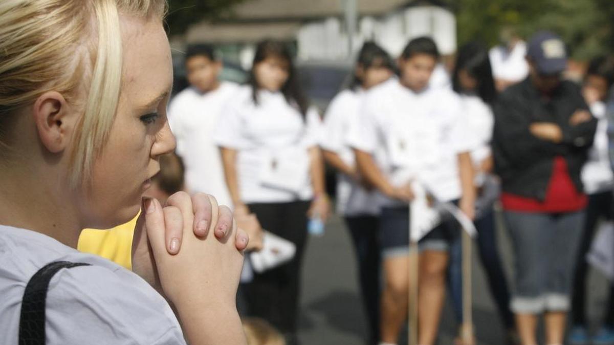 Dallas Kendall was 17 and attending Richland High School when she was praying during a moment of silence prior to a suicide awareness march held in 2011.