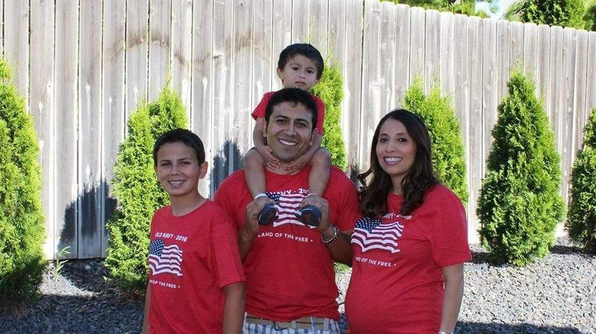 Paul Quintana, center, with sons Michael, left, and Christian, on shoulders, and wife, Mari, right. Mari was pregnant with the couple’s daughter, Jessica, when the photo was taken.