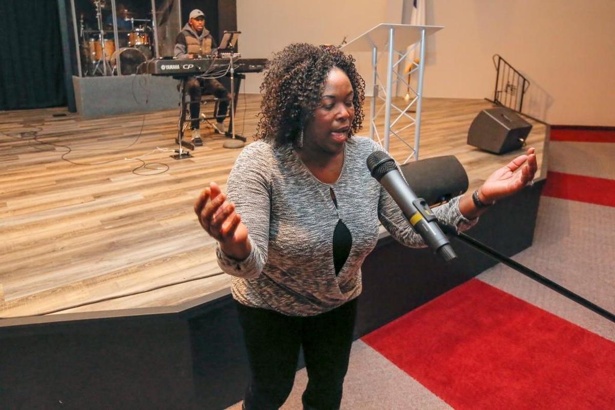 Eloiuse Sparks sings inside of Grace Point Church in Pasco on Saturday during choir practice. Sparks is the choir leader.
