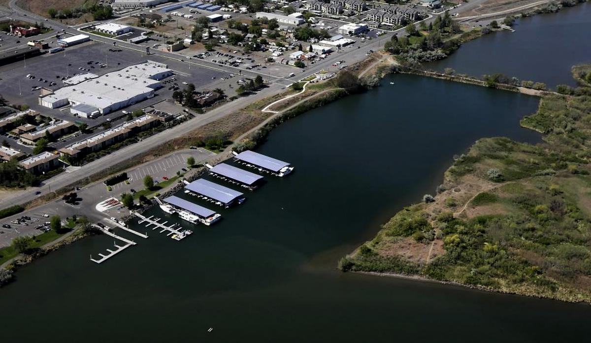 The U.S. Army Corps proposes taking out the causeway to Bateman Island on the Columbia River at Richland to help salmon, leaving access by boat.