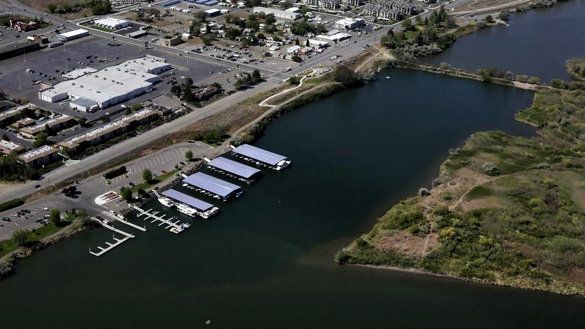 The U.S. Army Corps proposes taking out the causeway to Bateman Island on the Columbia River at Richland to help salmon, leaving access by boat.