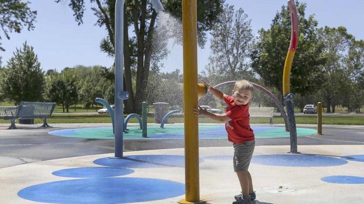 Jacob Bryner, 4, plays in the spray park at the Playground of Dreams in Columbia Park in Kennewick. The National Weather Service is calling for today’s weather to be mostly sunny, with highs near 77 and winds from 9 to 13 mph.