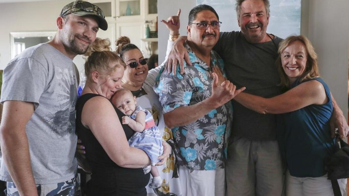 Justin’s Elzinga’s family gathers for a photo with Bobby Nakihei in 2017.  The heart and kidney of Justin, 20, of Kennewick, were donated to Nakihei, who has died of complications of COVID-19.