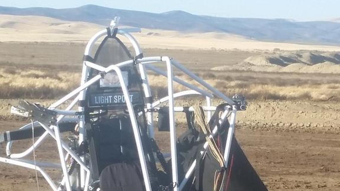 The remains of a powered parachute that crashed Thursday after it got tangled in powerlines.