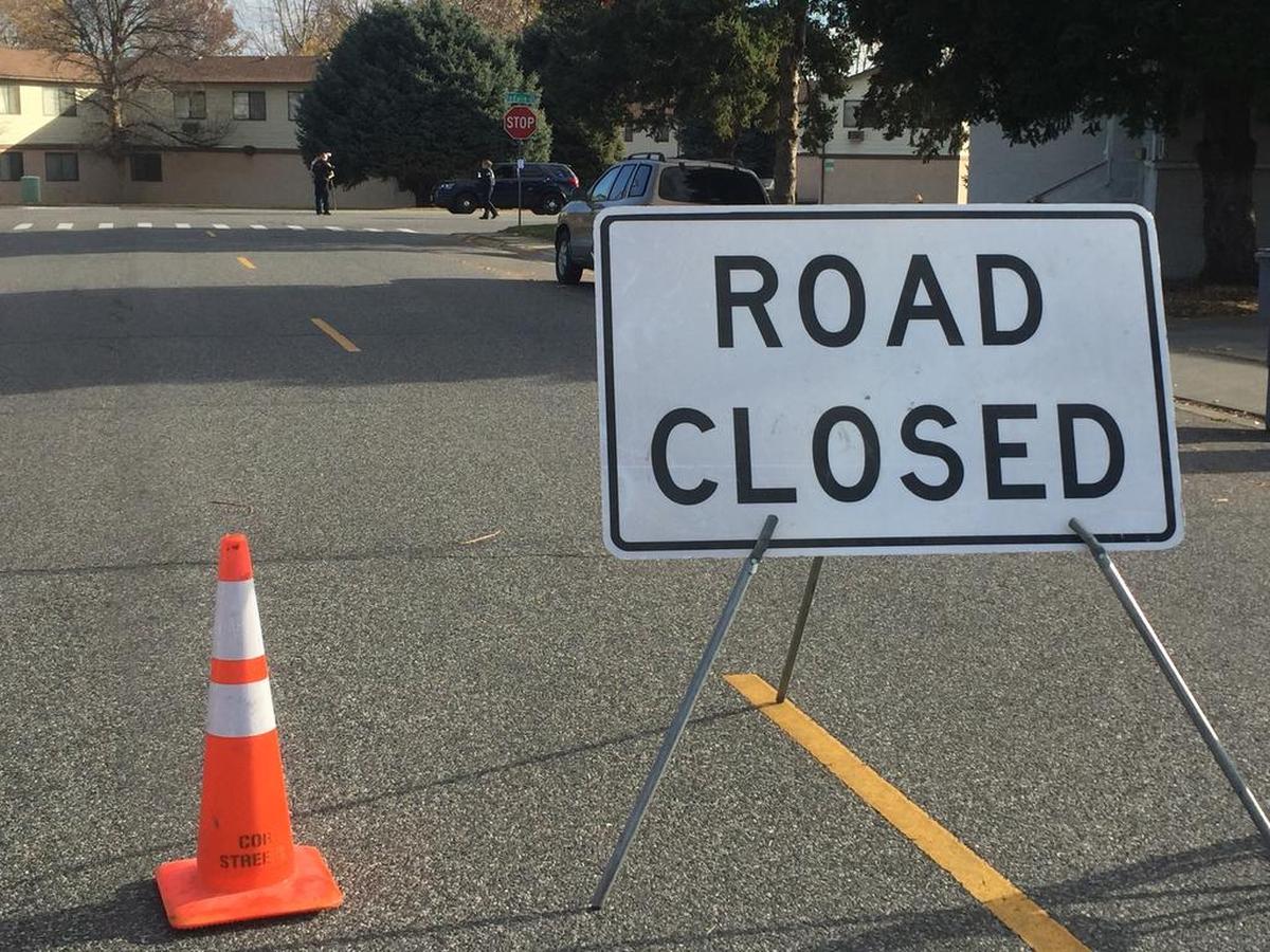 Richland police closed Wilson Street Wednesday morning as they continue to investigate a crash that seriously injured two boys who were crossing the street at Jadwin Avenue.