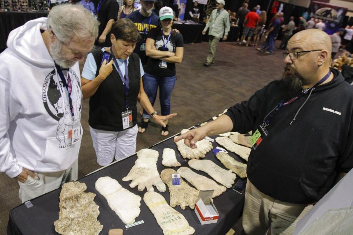Sasquatch enthusiasts talk and listen to Johnathan Sumerlin during the International Bigfoot Conference at the Three River Convention Center in 2017. Sumerlin spoke about the Bigfoot sitings he has witnessed.