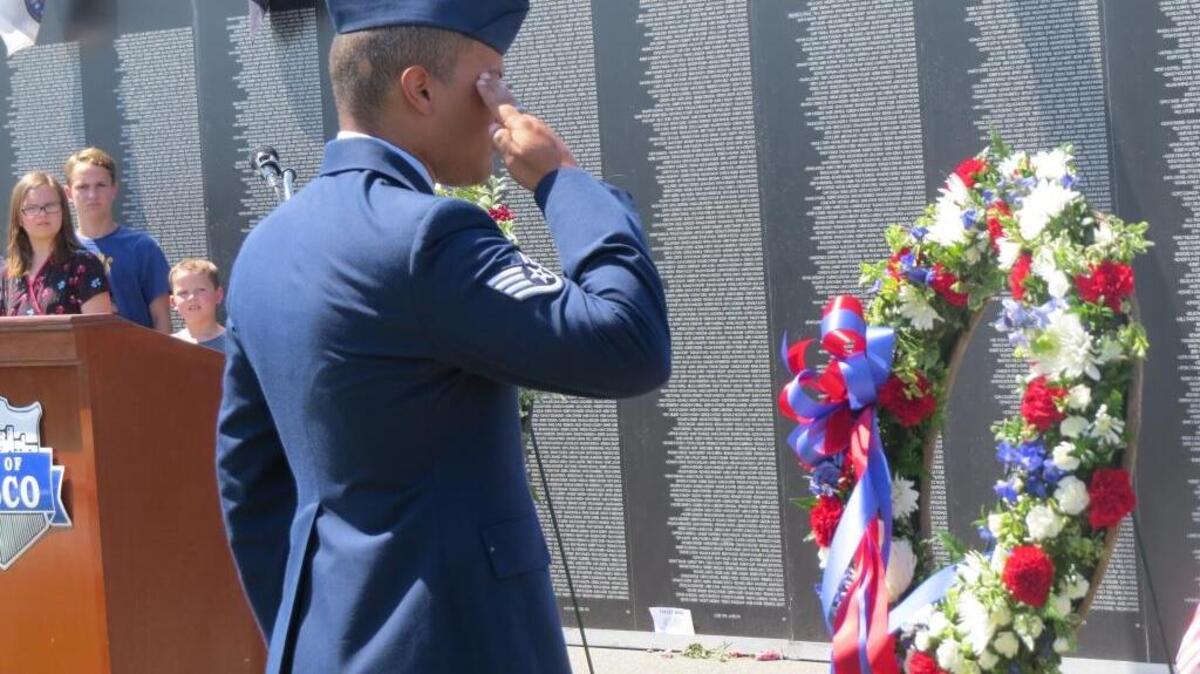 A wreath was placed in front of a replica of the Vietnam Veterans Memorial at City View Cemetery in Pasco during a Memorial Day ceremony to honor veterans.