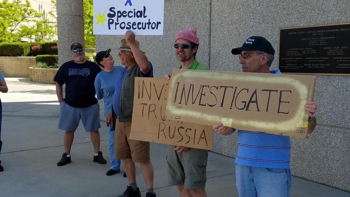 A group of protesters gathered Wednesday afternoon outside the Benton County Justice Center.